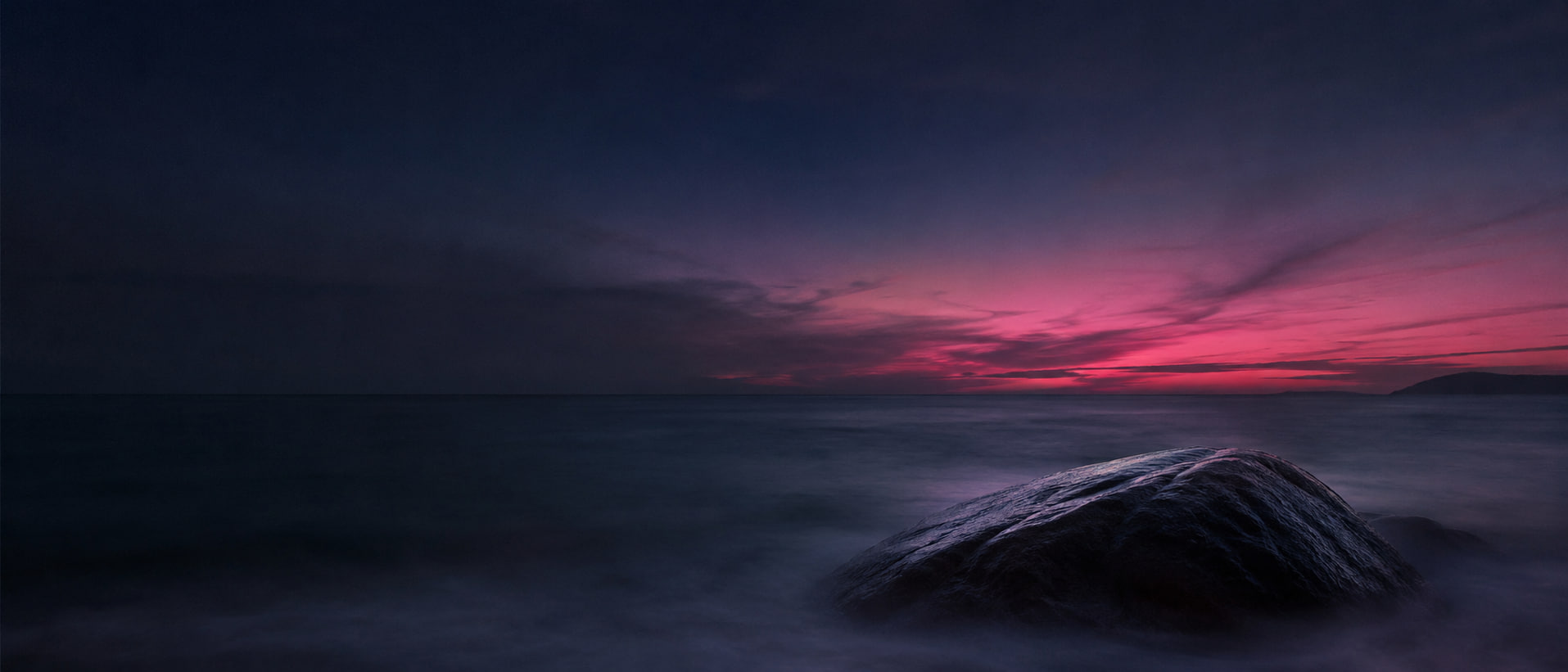 Sea and rocks at twilight